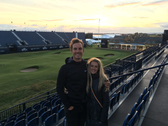 Jamie and Tiva in front of a golf course.